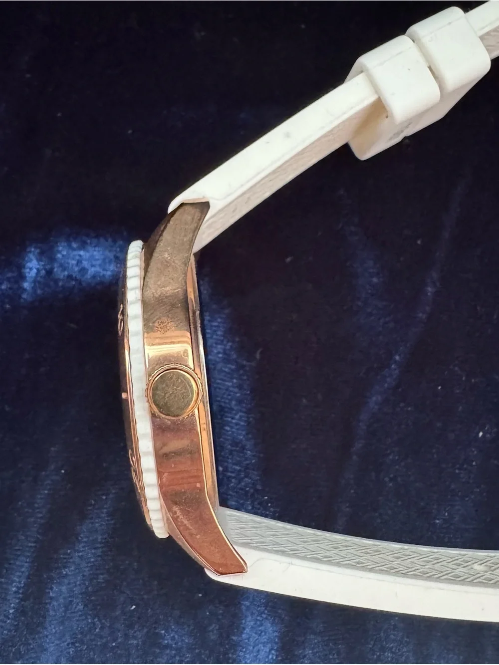 Tommy Hilfiger, vintage(ish), rose-gold tone with a rubber watch band. SO COOL!